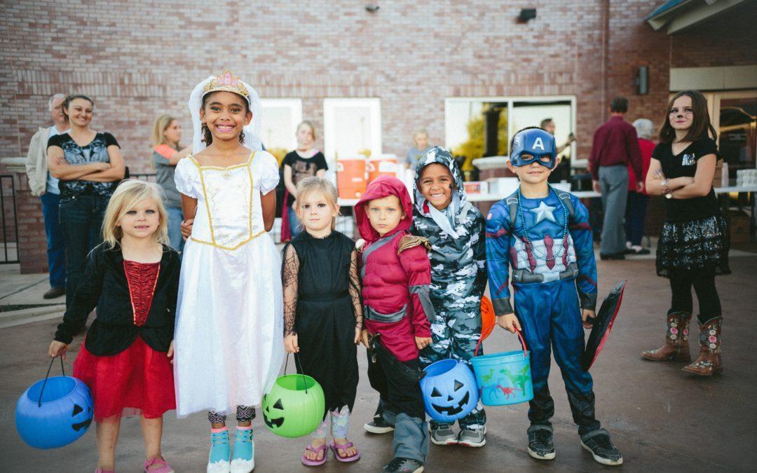 Kids in Halloween costumes